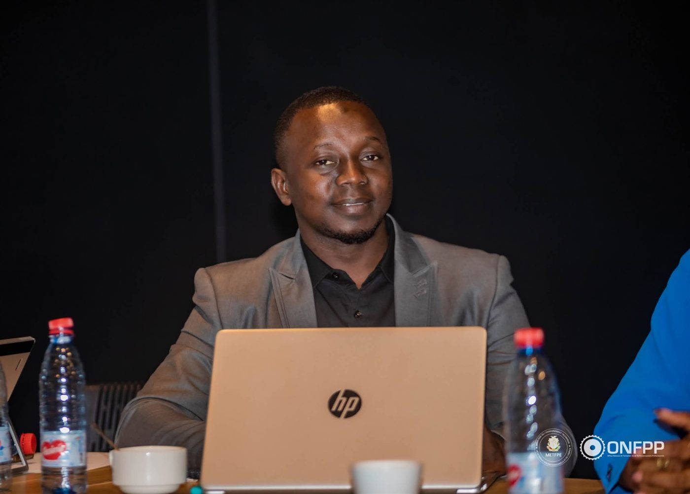 Participant en session de formation ONFPP avec ordinateur